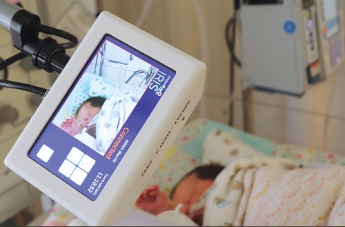 An AngelEye Camera — a secure, live stream video service now installed at Chester County Hospital's NICU — looks over a newborn’s crib.